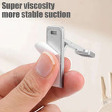 Mini Foldable Phone Stand – Adjustable Zinc Alloy Laptop Holder with Self-Adhesive Kickstand